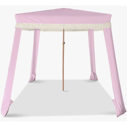 Luxury pink tassel cabana rental on Anna Maria Island beach, set up for a bachelorette party or girls beach day.